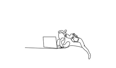 a mother and her child playing games with a phone in hand, lying comfortably at home in front of a laptop