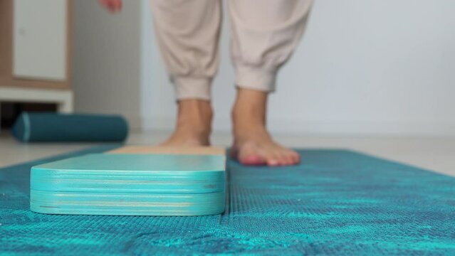 Open, lay out several sadhu boards for the practice of sadhu yoga. Preparation for standing on nails.