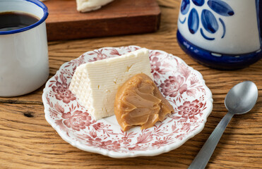 Artisanal fresh white cheese with dulce de leche, typical brazilian country dessert