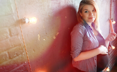 Pregnant young beautiful girl on the ninth month