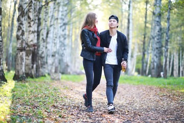 Fototapeta premium Loving couple walking in casual clothes