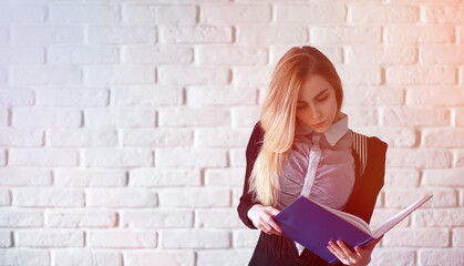 Young pretty blonde girl student