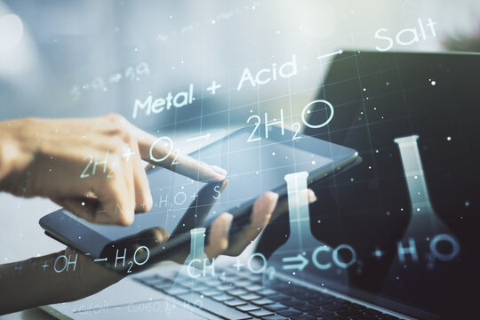 Creative chemistry hologram and hand working with a digital tablet on background, pharmaceutical research concept. Multiexposure - Powered by Adobe
