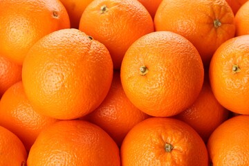 Fresh ripe oranges as background, top view