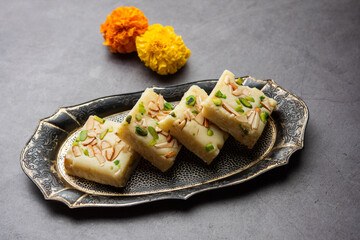 Milk powder barfi also known as Mava burfi, white Khoya burfi or Barfee, Indian Sweet food
