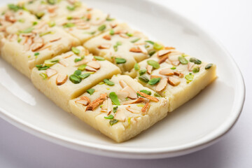 Milk powder barfi also known as Mava burfi, white Khoya burfi or Barfee, Indian Sweet food