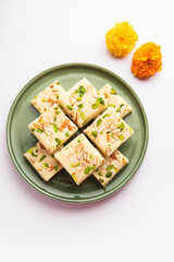 Milk powder barfi also known as Mava burfi, white Khoya burfi or Barfee, Indian Sweet food
