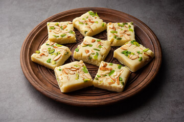 Milk powder barfi also known as Mava burfi, white Khoya burfi or Barfee, Indian Sweet food