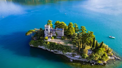 Gordijnen Amazing lake Iseo scenery with picturesque small island Loreto with castle, aerial drone view. Italy, Brescia province © Freesurf