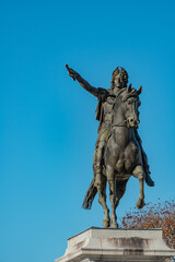 Fototapeta premium Statue of Louis XIV in Montpellier france park in autum with clear sky royal monarch