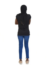 back view of a women with casual clothing and burka arms crossed on white background