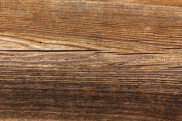 Fototapeta premium Wooden background or texture. Burnt wood with knots.