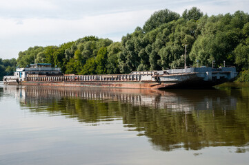 Cargo barge, a vessel for inland river navigation along the riverbed. River water transport for cargo transportation