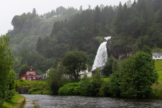Water from the Fosselva river drops down the 50 m high powerful Steindalsfossen, Norway