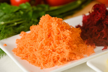 Close-up of chopped carrot for making traditional Ukrainian borscht.