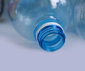 Used plastic bottle on a light background