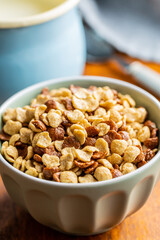 Breakfast cereal flakes in bowl.
