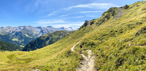 Panoramic view of a hiking trail through the Austrian Alps in the high mountains of the Zillertal near the Tux Glacier in summer, Tirol Austria Europe