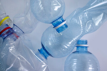 Used plastic bottle on a light background
