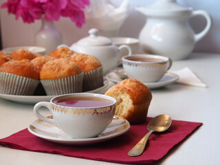 Breakfast with tea and cupcakes