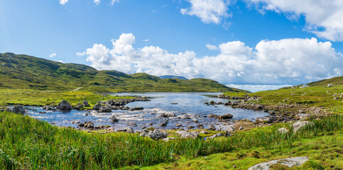 Fototapeta na wymiar Wide panoramic landscape on Isle of Lewis and Harris, Scotland, UK