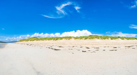 Wide panoramic view of Luskentyre Sands beach on the Isle of Harris, Scotland, UK
