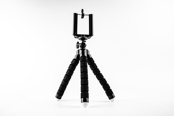 Tripod for smartphone on a white background. Phone stand.