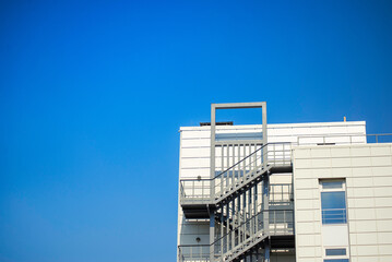 Architectural details of a modern office building. Modern European complex. against the sky.