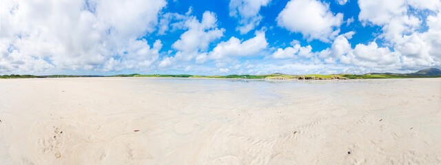 Wide panoramic view of Ardriol beach in Uig Bay on Isle of Lewis, Scotland, UK