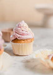 cupcakes with whipped butter cream blackberry strawberry lemon cake