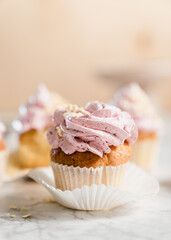 cupcakes with whipped butter cream blackberry strawberry lemon cake