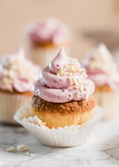 cupcakes with whipped butter cream blackberry strawberry lemon cake