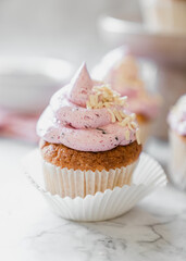 cupcakes with whipped butter cream blackberry strawberry lemon cake