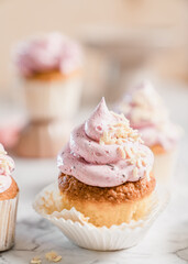 cupcakes with whipped butter cream blackberry strawberry lemon cake