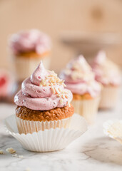 cupcakes with whipped butter cream blackberry strawberry lemon cake