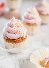 cupcakes with whipped butter cream blackberry strawberry lemon cake