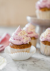 cupcakes with whipped butter cream blackberry strawberry lemon cake