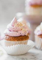 cupcakes with whipped butter cream blackberry strawberry lemon cake