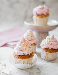 cupcakes with whipped butter cream blackberry strawberry lemon cake