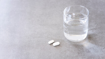 pills in glass