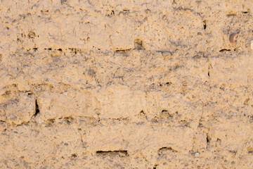 fondo - textura de una pared de barro en sudamérica. Concepto de texturas y fondos.