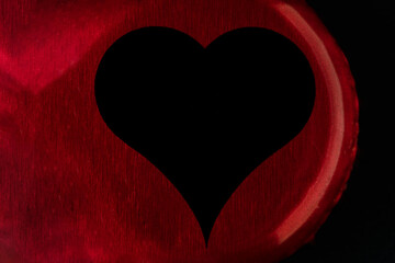 Black heart Red background in foreground 