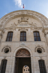 Fragments of North portal of Hotel des Invalides (National Residence of Invalids, 1671 - 1676) – now complex of museums and monuments relating to military history of France. PARIS, FRANCE.