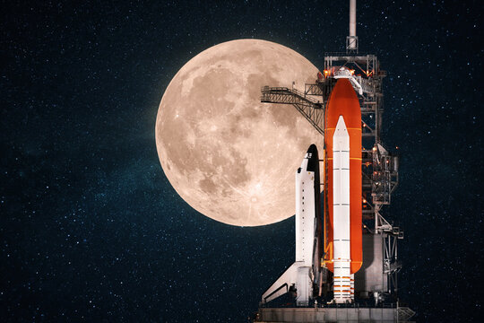 beautiful space shuttle prepares for launch against the backdrop of an amazing full moon in the starry sky. Space mission, concept.