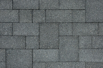 decorative tiles for the sidewalk. in the photo, a sidewalk tile in close-up