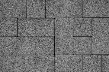 gray background,in the photo decorative finishing tiles for the sidewalk