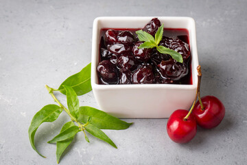 Jars with freshly homemade cherry jam, sour cherry jam, Turkish name; Visne receli