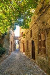 Fototapeta na wymiar Stone street of the historic center of the city of Rhodes, Greece, Europe.