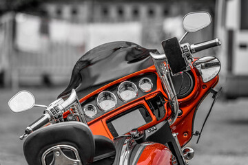 Chrome motorcycle parts. Biker background. At the wheel of a large heavy motorcycle. Gauge panel of...
