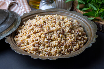 Traditional delicious Turkish foods; bulgur pilaf with green lentils (Turkish name; yesil mercimekli bulgur pilavi)